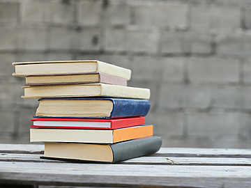 School books on bench