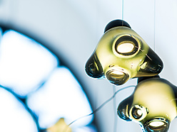 a group of lights from a ceiling