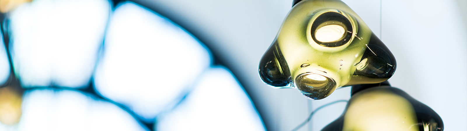 a group of lights from a ceiling