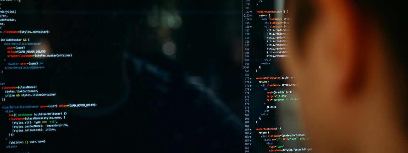 Person looking at screen of code