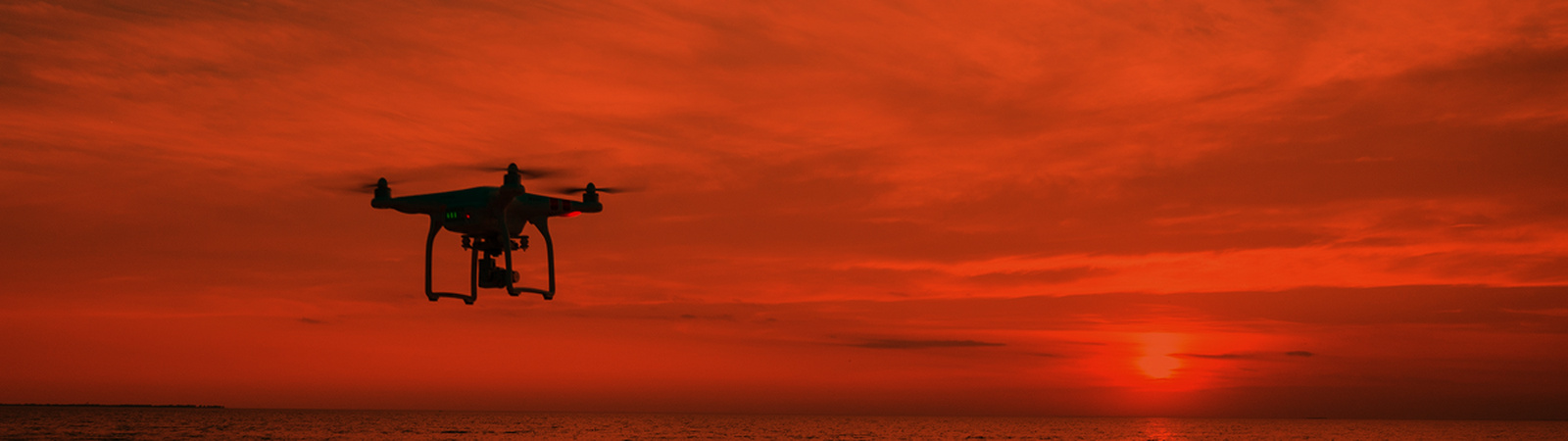 Drone flying over ocean