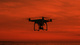 Drone flying over ocean