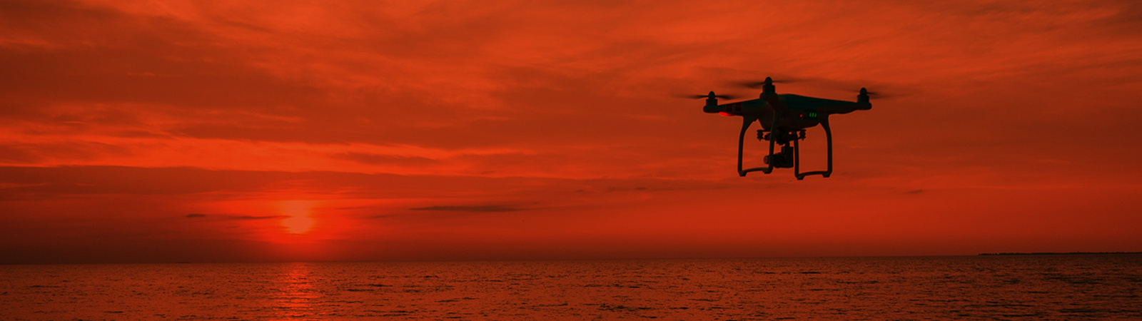 a drone flying over water