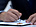 Person signing divorce papers