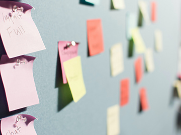 Sticky post it notes on wall