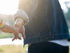 Couple holding hands