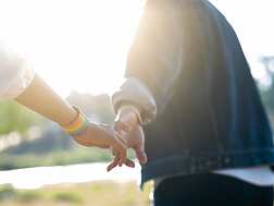 Couple holding hands