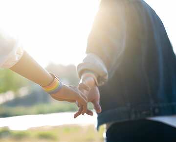 Couple holding hands
