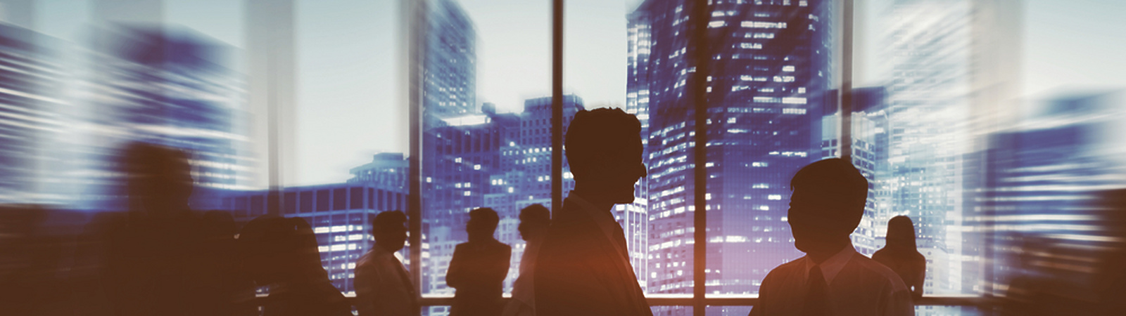 a silhouette of a person shaking hands with other people in a room with windows