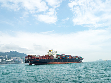 a large ship with containers on it
