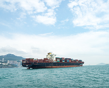 a large ship with containers on it