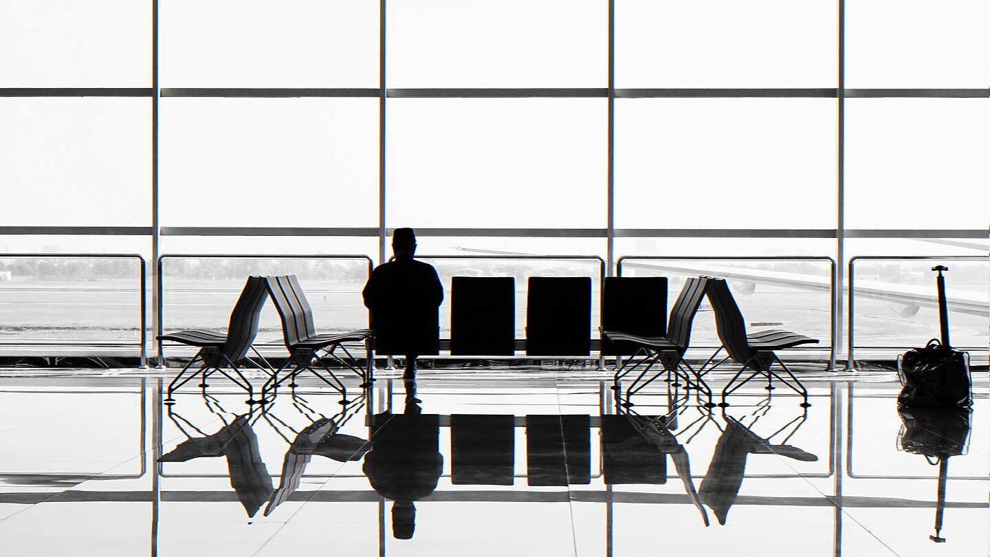 Man waiting in an airport