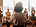 Woman giving a speech in front of a group of women.