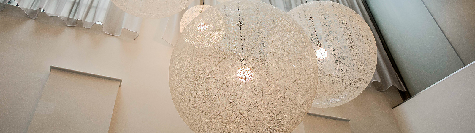 a group of lights from the ceiling