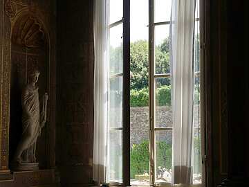 Dark room with tall window