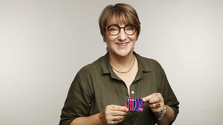 a person holding a card