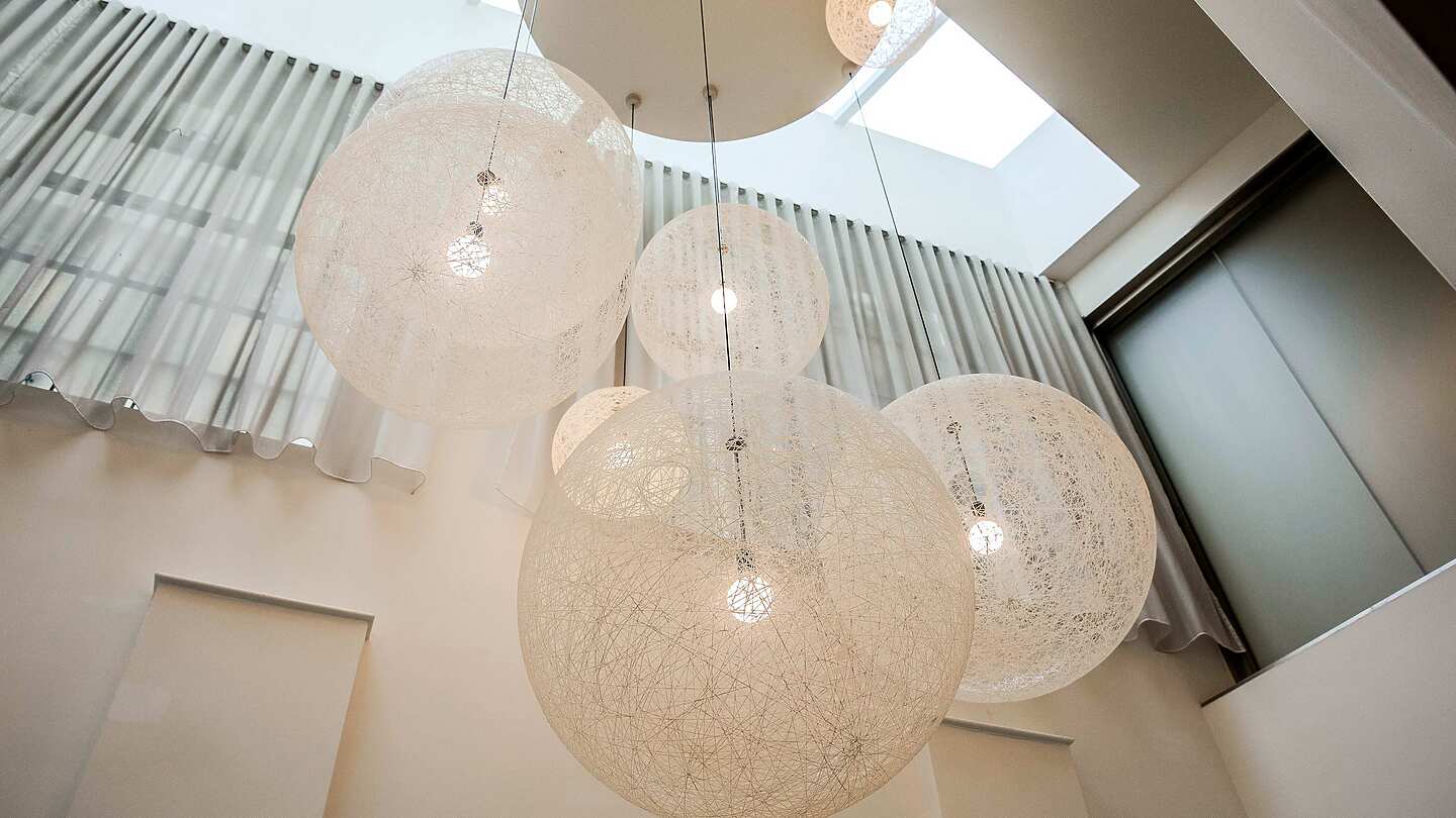 a group of lights from the ceiling