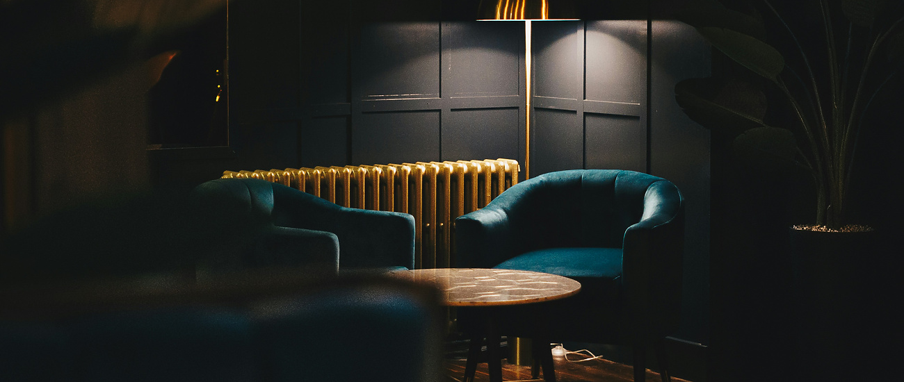 a room with a table and chairs