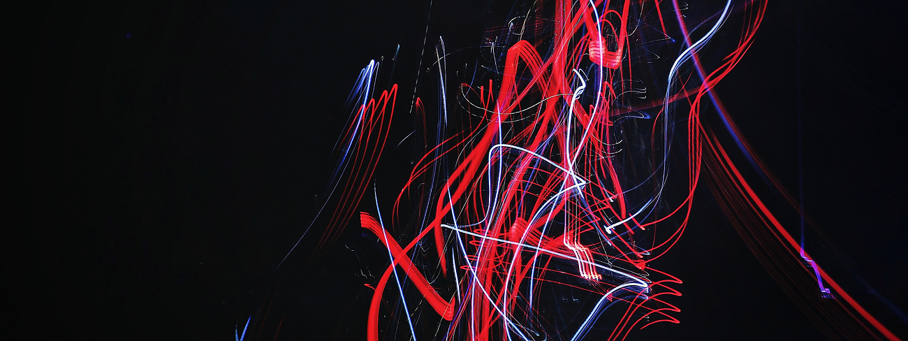 abstract red lines on black background