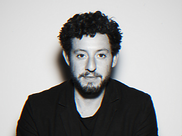 a person with a beard and mustache