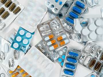 a group of pills in blisters
