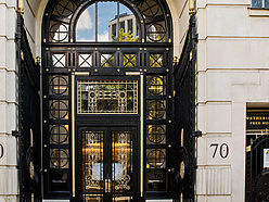 a black door with a glass panel