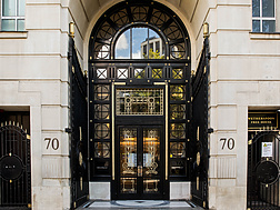 a black door with a glass panel
