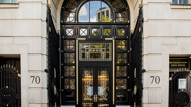 a black door with a glass panel