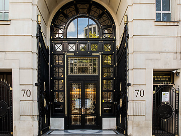 a black door with a glass panel