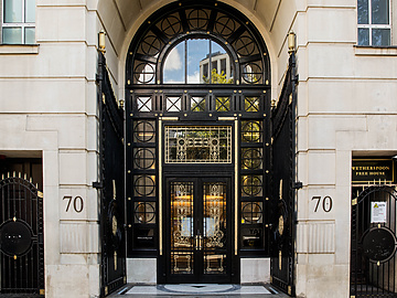 a black door with a glass panel