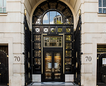 a black door with a glass panel