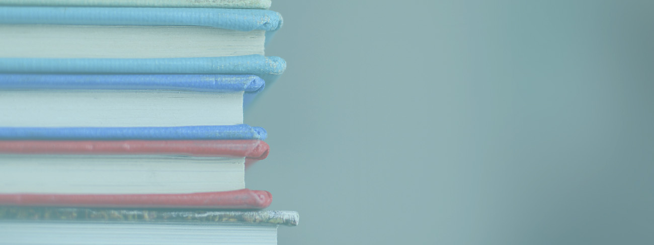 A collection of books on desk