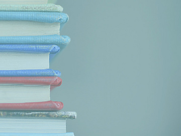 A collection of books on desk