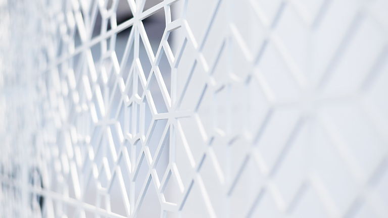 a close up of a white wall