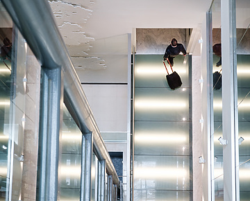 man walking with a suitcase