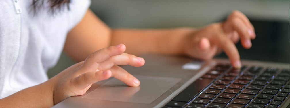 Child using laptop