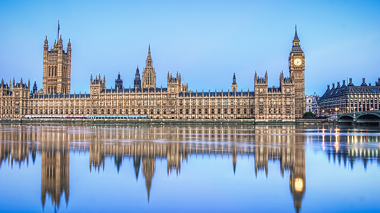 big ben reflecting in the river thames