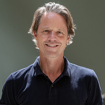 a person smiling for a picture