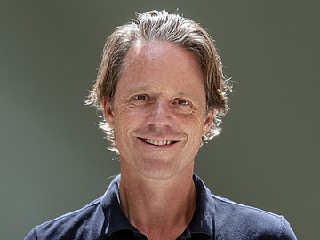 a person smiling for a picture