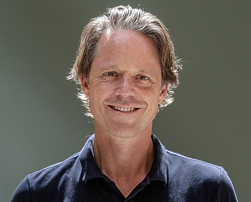 a person smiling for a picture