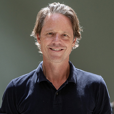 a person smiling for a picture