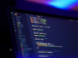 A laptop with code on the screen