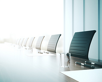 boardroom table with chairs