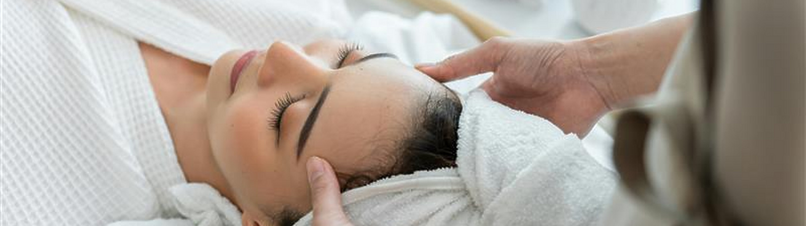 a person getting a face massage