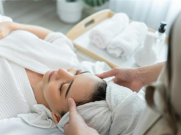 a person getting a face massage