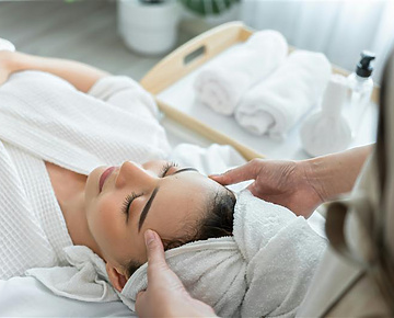a person getting a face massage