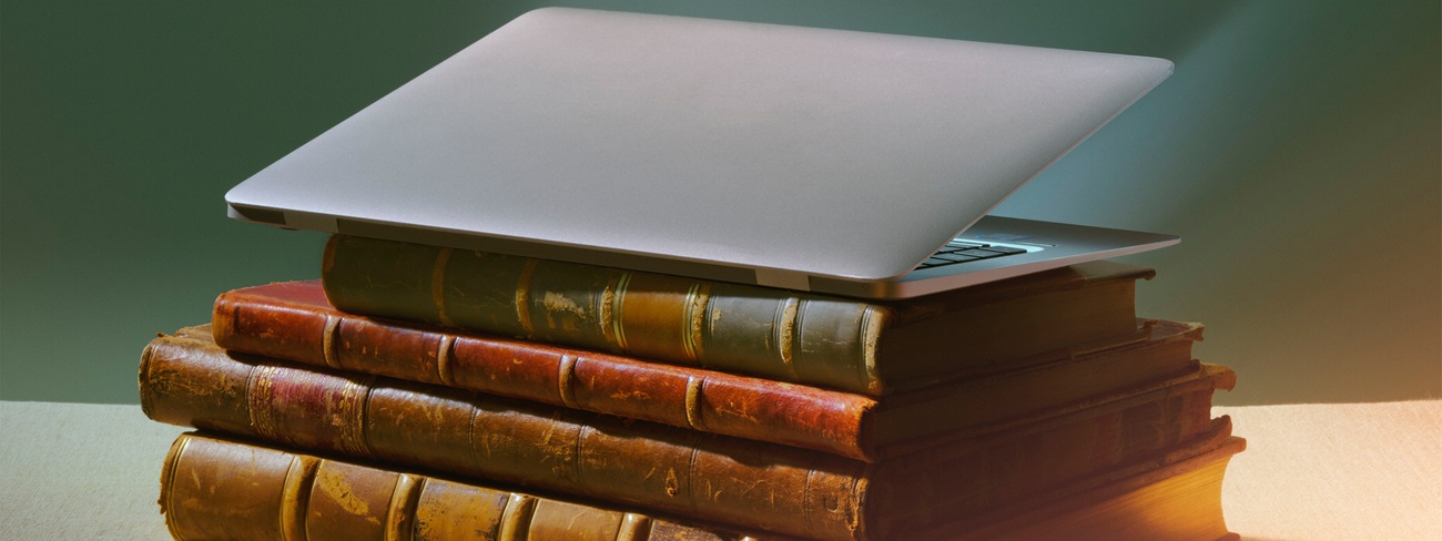 Laptop on top of books