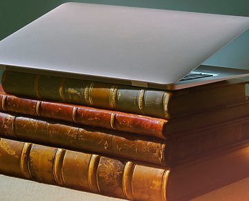 Laptop on top of books