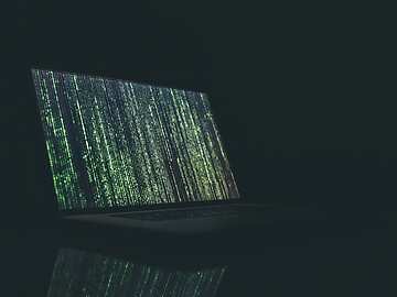 a laptop with green lights