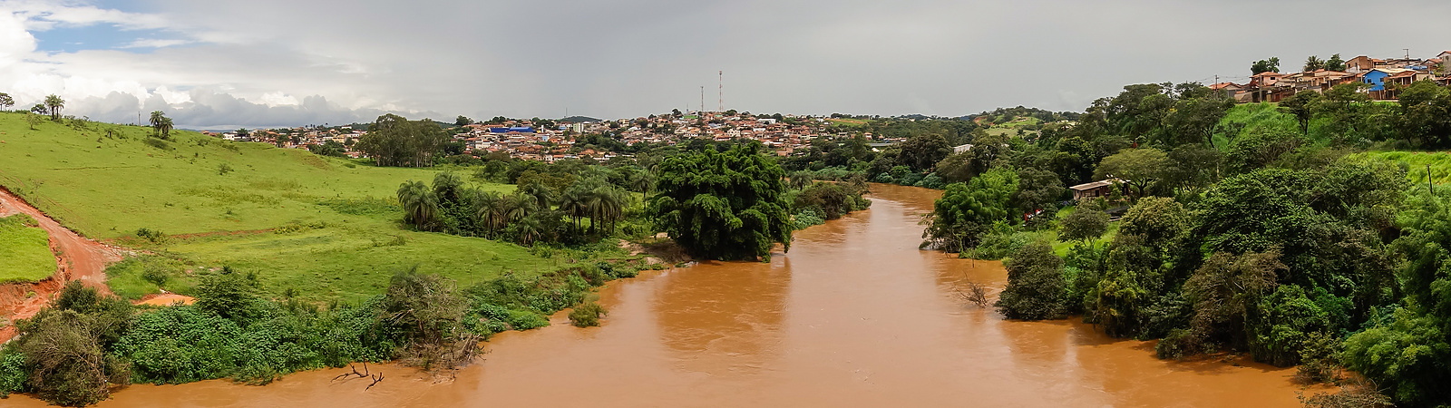 Paraopeba river overflowing after summer rains in Brumadinho, Minas Gerais, Brazil. Panoramic